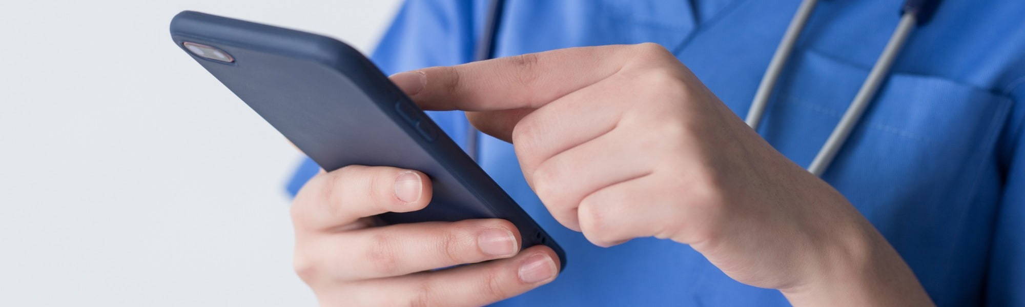 nurse texting mobile phone